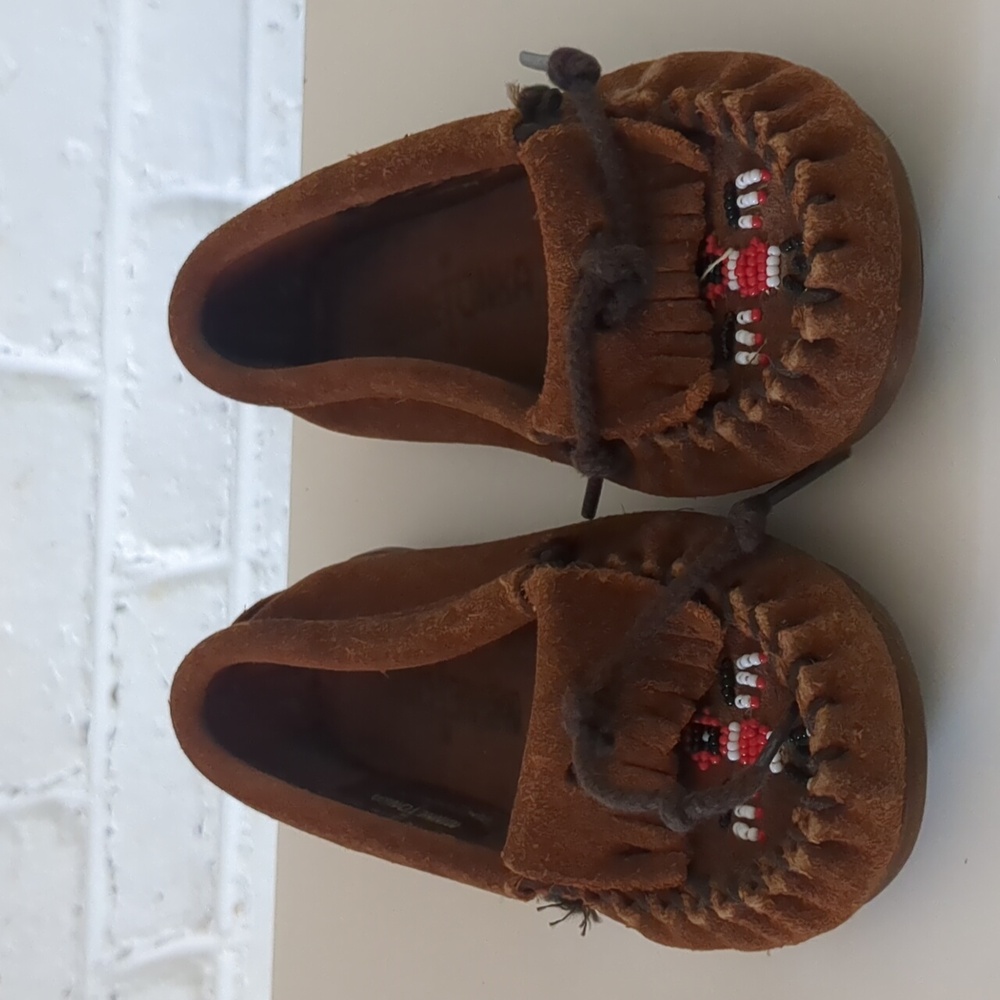 Minnetonka beaded thunderbird slip on Moccasin